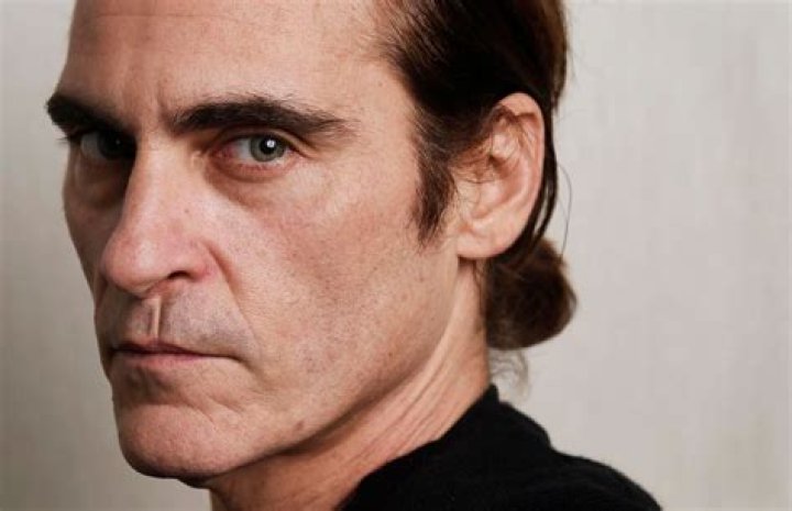 Joaquin Phoenix's Iconic Hair & Lip Looks: A Deep Dive