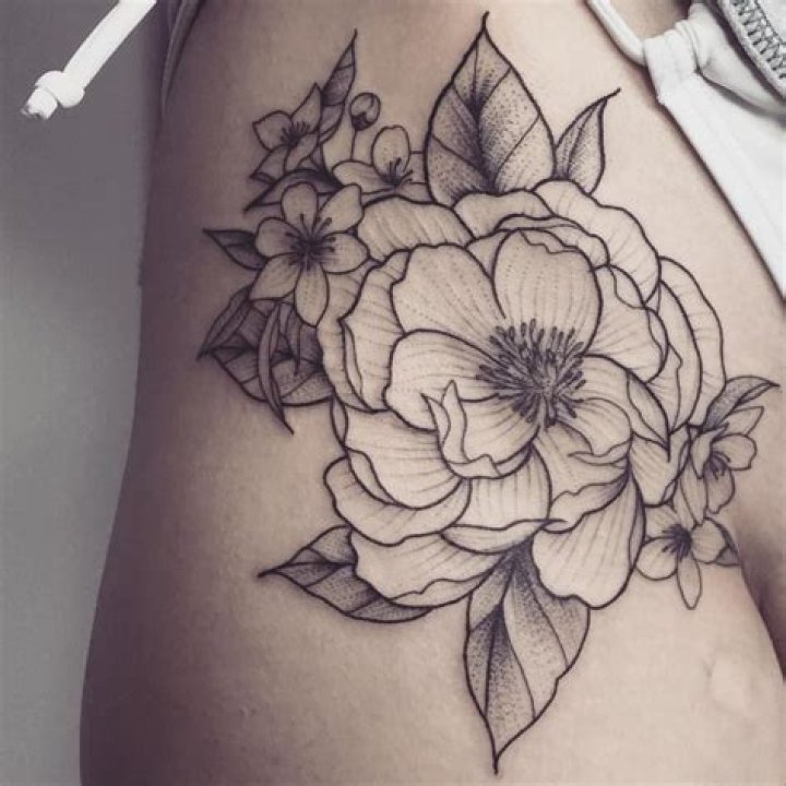 Embrace Your Style: The Allure of Small Flower Tattoos on the Hip